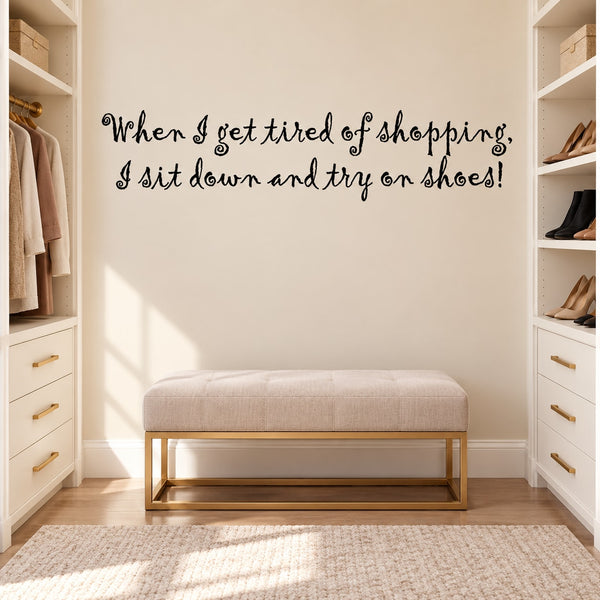Cursive shopping quote wall decal: 'I sit down and try on shoes'