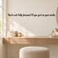 Wall quote decal with text: “You're not fully dressed til you put on your smile”