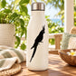 White bottle with black cockatiel decal
