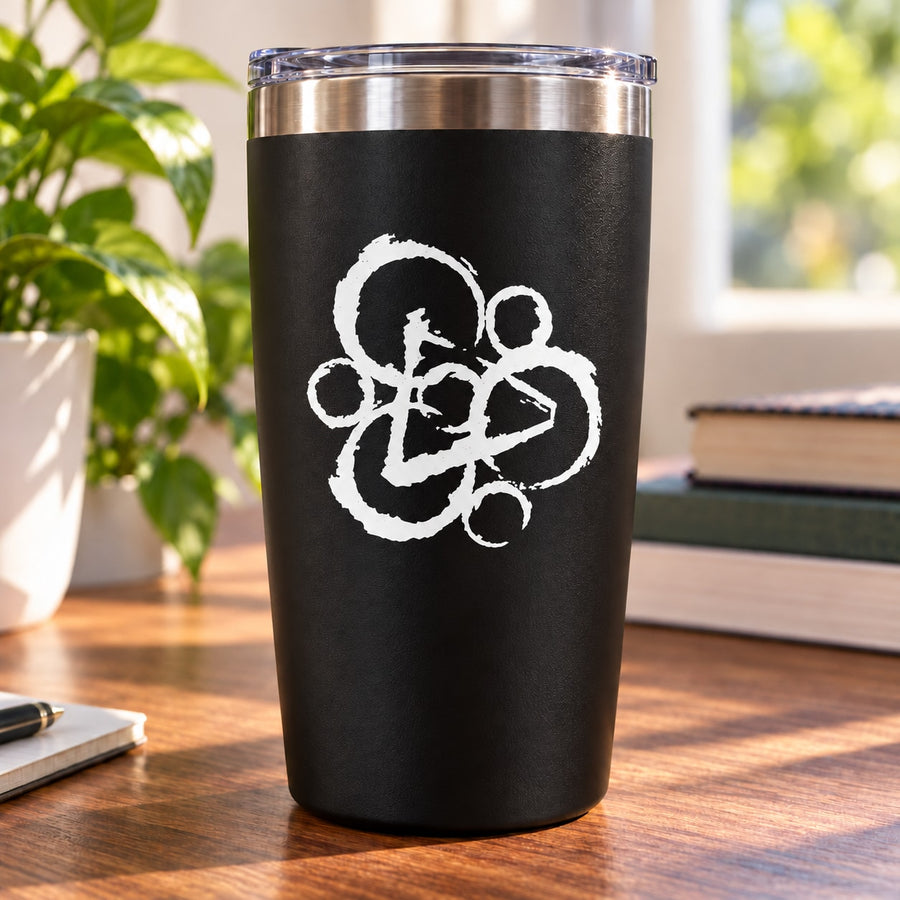 Black tumbler with white Coheed and cambria symbol decal
