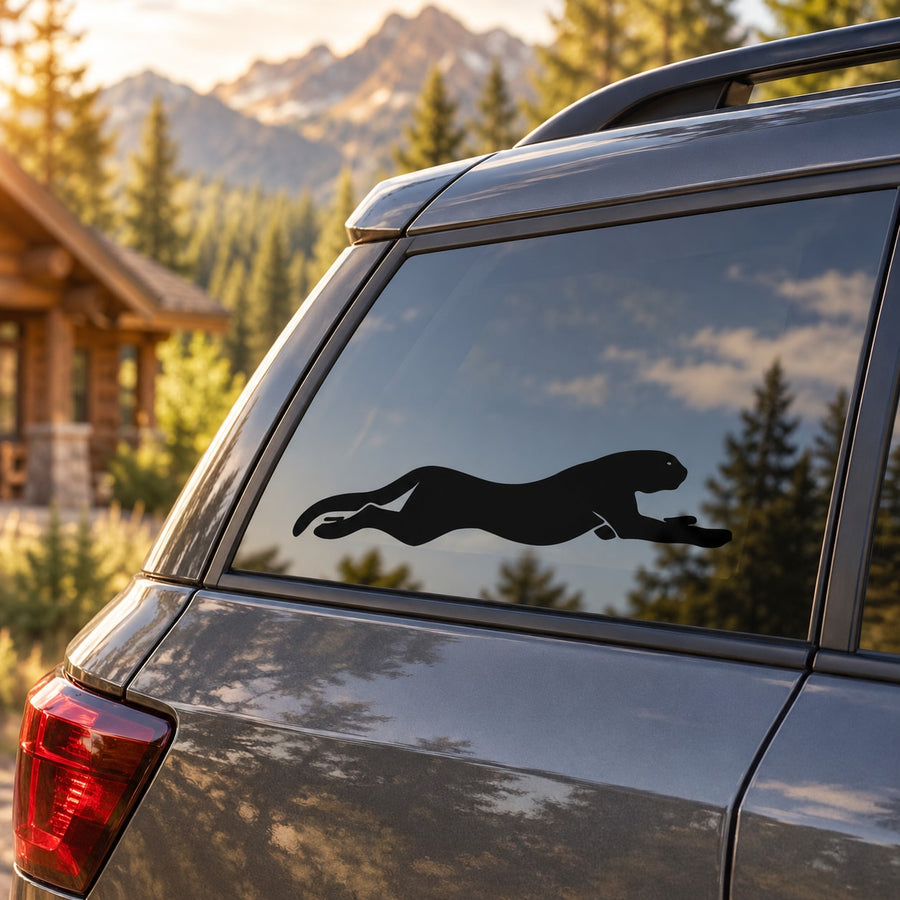 Cougar sprinting silhouette vehicle decal, black running cat graphic