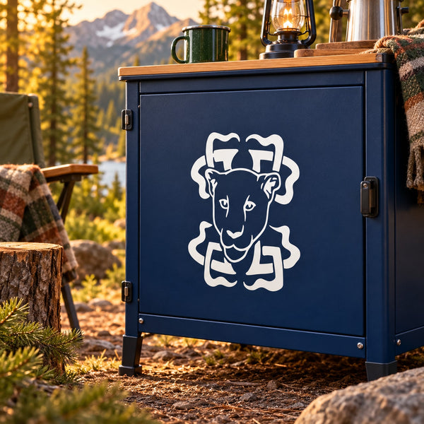 Tribal cougar head decal in white on dark blue cabinet door