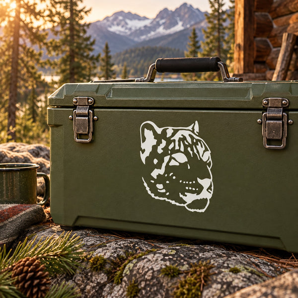 Snow leopard head decal graphic in white on a dark green metal toolbox
