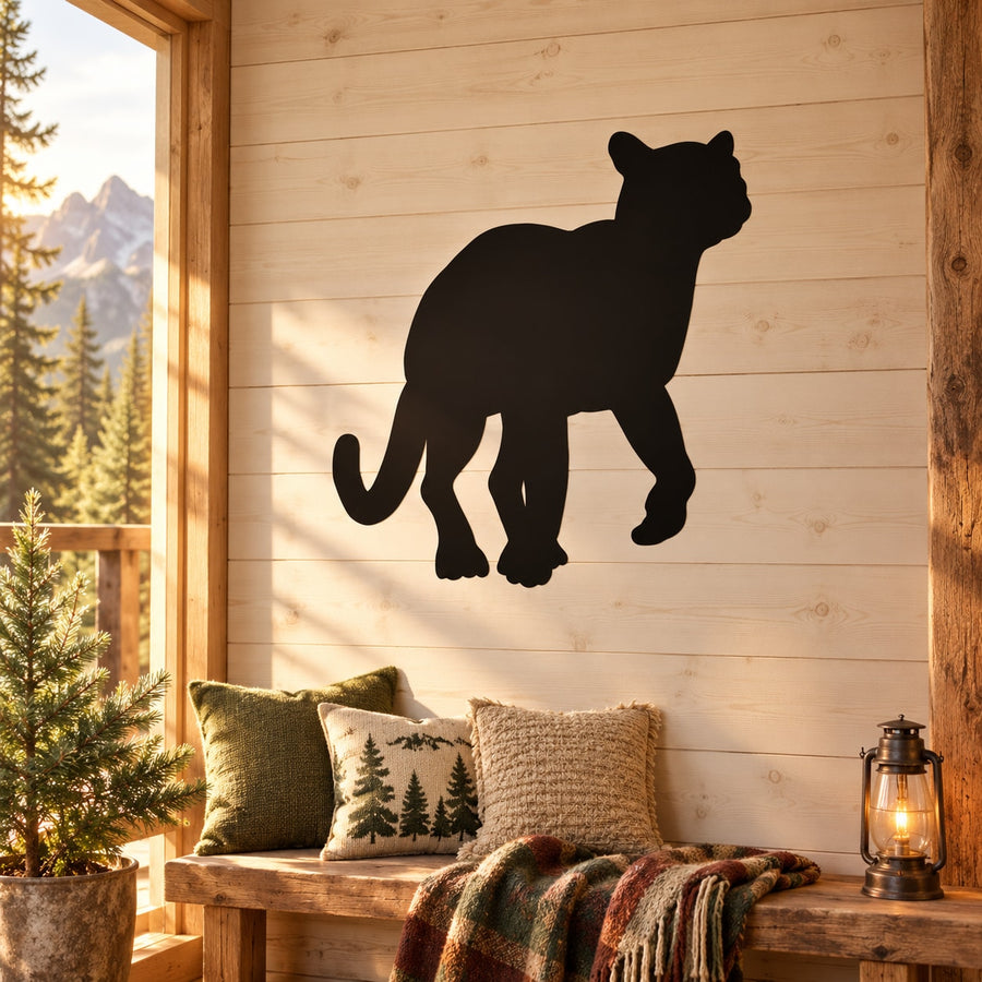 Black cougar silhouette wall decal, sitting profile with curved tail and front paws