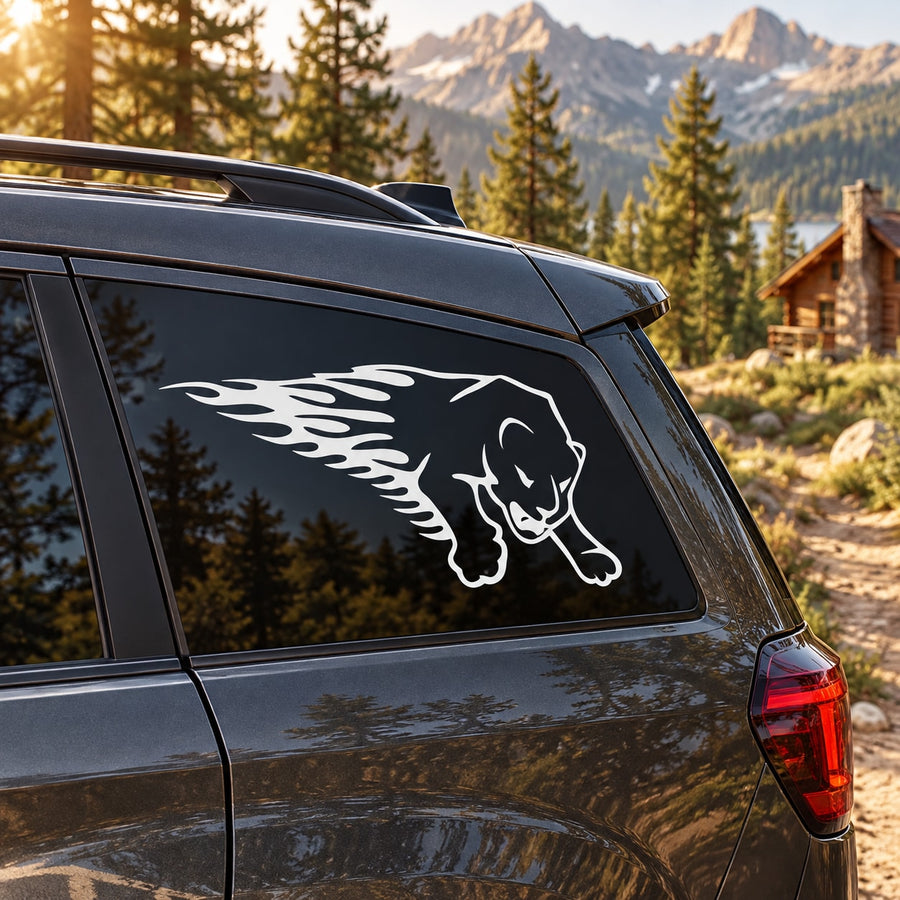 Car window decal with black cougar emblem and fire burst flame graphic