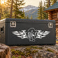 Winged cougar emblem decal on black surface