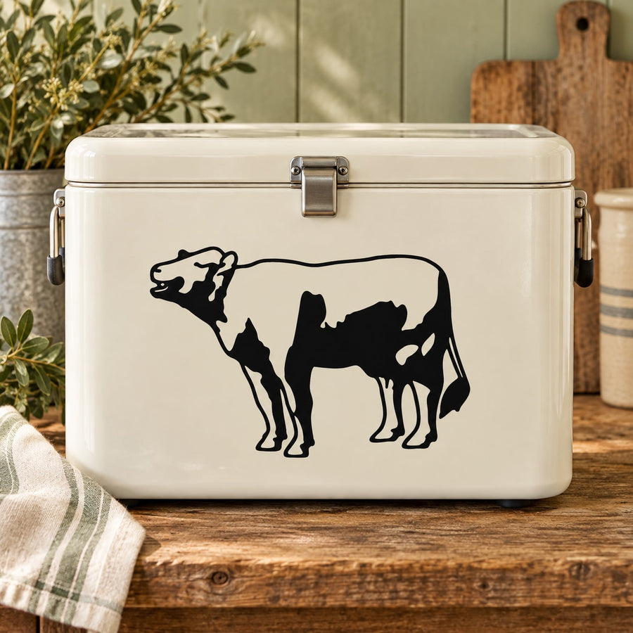Hereford cow decal in black on a light cream surface