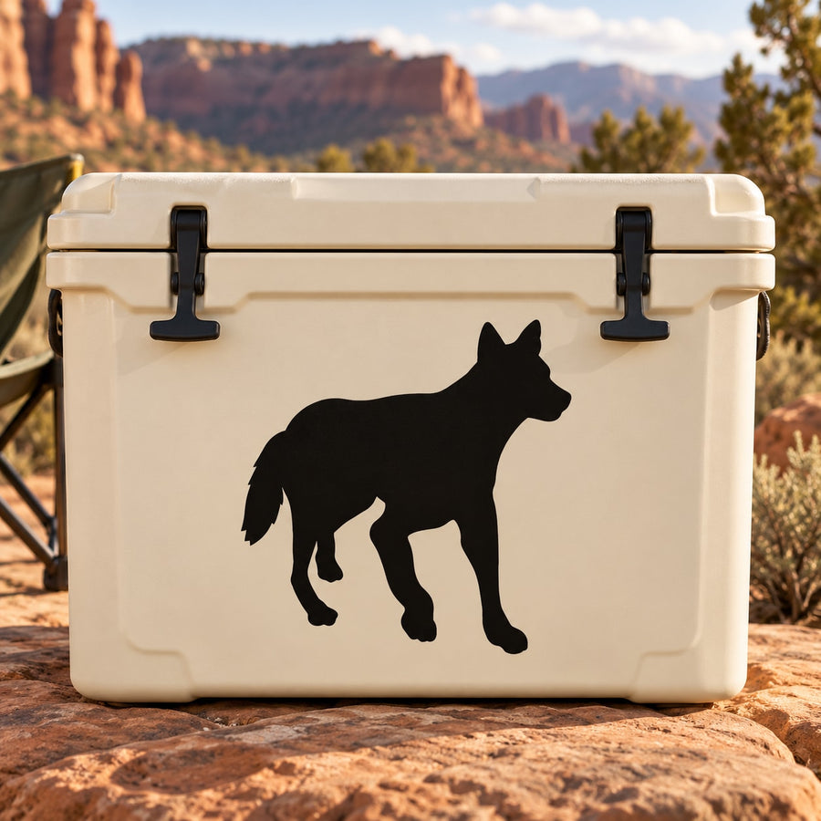 Black walking coyote decal graphic with detailed silhouette on a light cooler