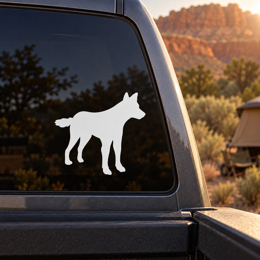 White coyote decal sticker on a vehicle window glass