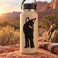 Coyote facing silhouette decal on cream-colored water bottle