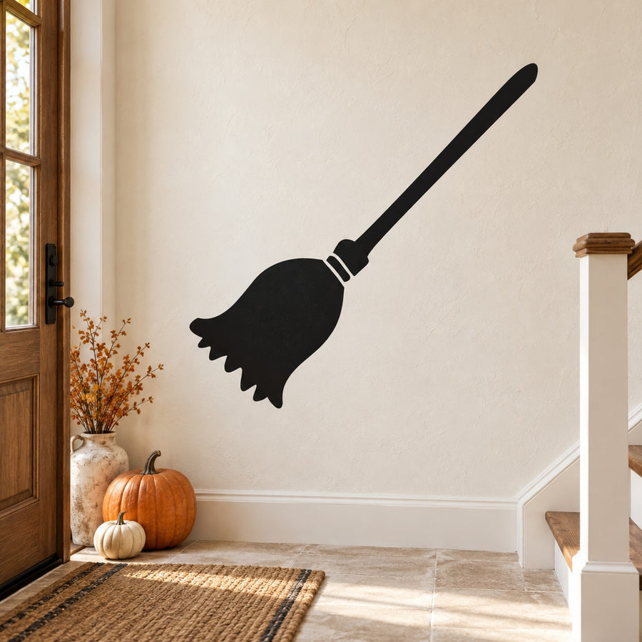 Bell-shaped broom wall decal with black silhouette