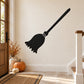 Bell-shaped broom wall decal with black silhouette