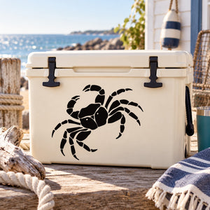 Black crab decal graphic on white cooler-style surface