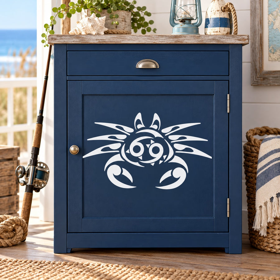 White tribal crab decal on blue cabinet door