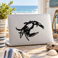 Black beach crab decal sticker on a laptop lid
