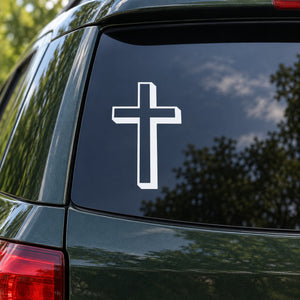 White cross decal on car rear window, outlined with transparent border