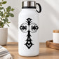 White bottle with black cross decal featuring crescent moons