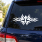 Cross-shaped tribal fire decal on dark car rear window