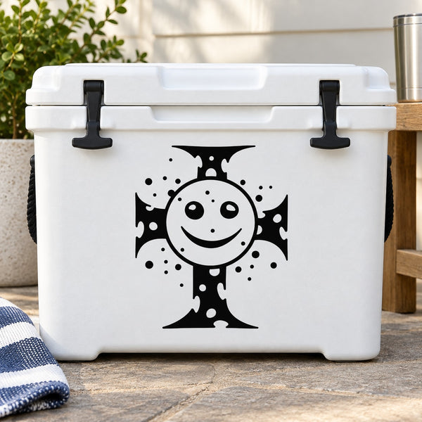 White plastic cooler with black happy face cross decal and carry latches