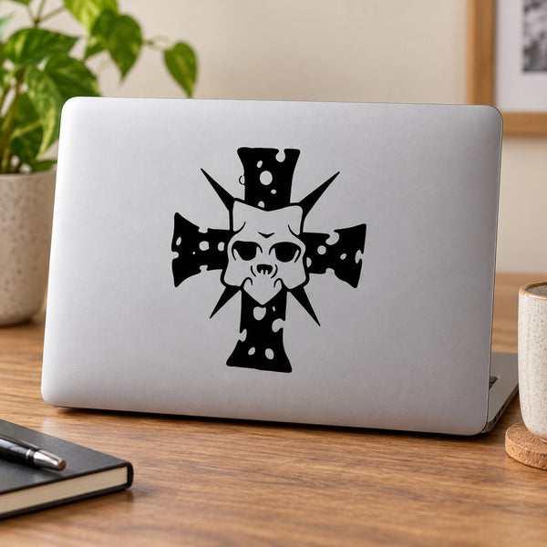Light gray laptop with black demon mask cross decal
