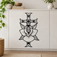 Black floral cross wall decal with ornamental center and symmetrical petal-like shapes