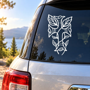 White vine cross with leaf decals on car rear window