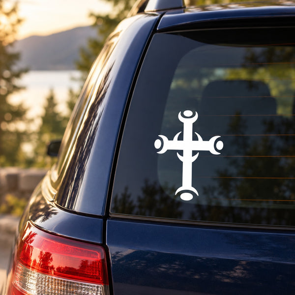 White spiked cross decal sticker on car rear window