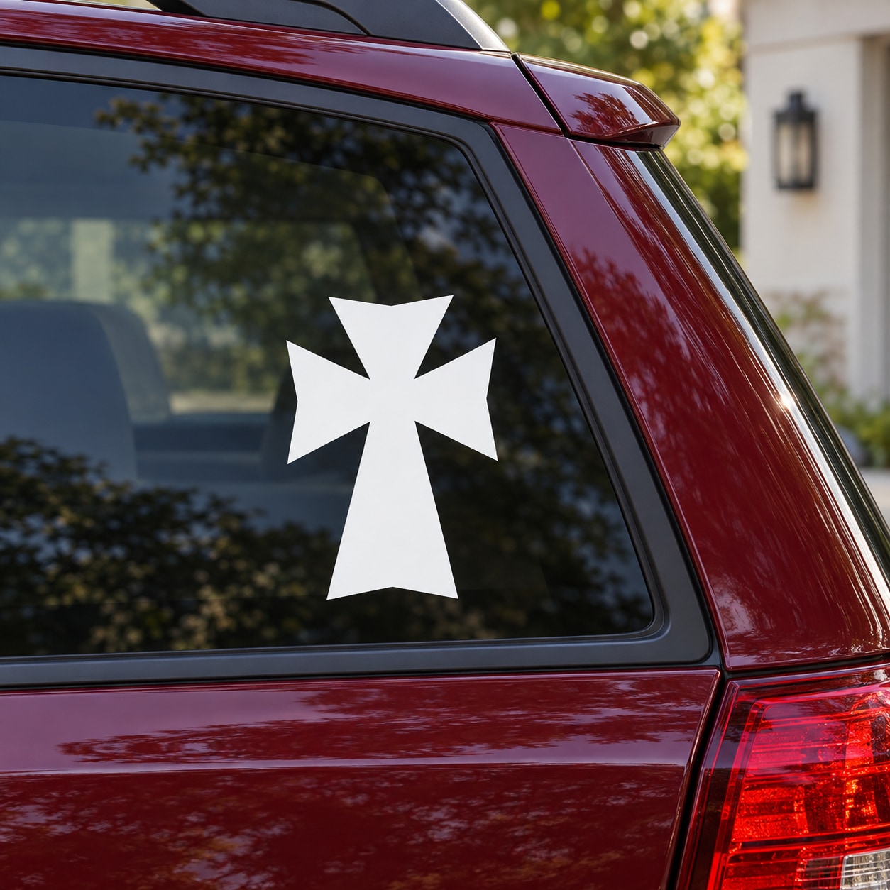 White Georgian cross car window decal on red vehicle