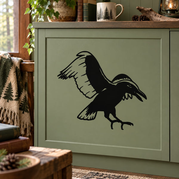 Black raven silhouette decal with wings spread