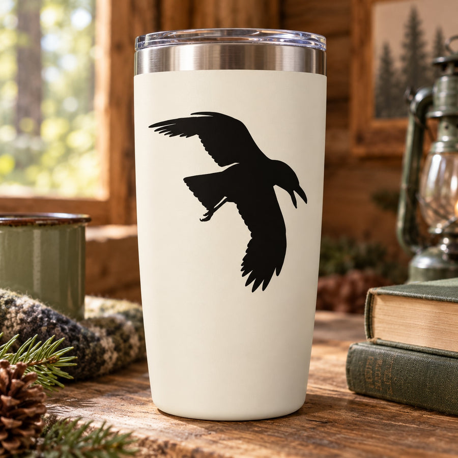 Raven silhouette decal on white tumbler, black bird wing design