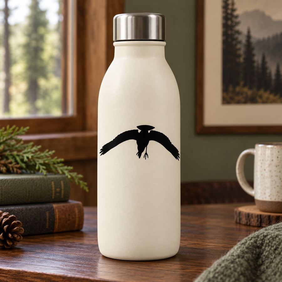 Black crow silhouette decal on white water bottle
