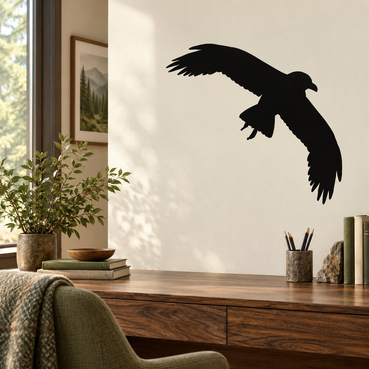 Black crow silhouette wall decal with spread wings and curved beak