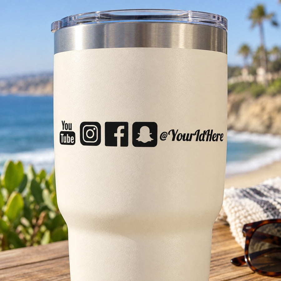 White tumbler with die-cut social media decal icons: YouTube, Instagram, Facebook, @YouIdHere
