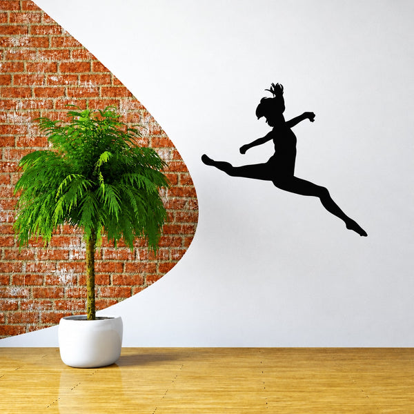 Prancing dancer wall decal, black silhouette of a dancing figure mid-leap