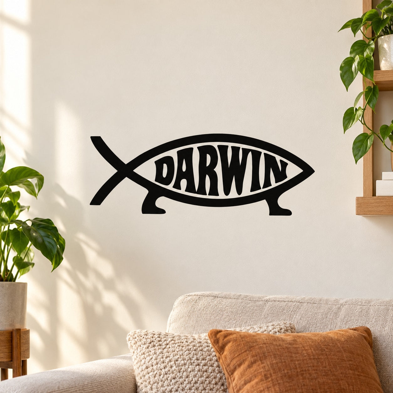 Black Darwin fish wall decal with outlined eye and stylized word 'DARWIN'