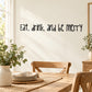Wall decal with cursive text: Eat, drink, and be merry for walls
