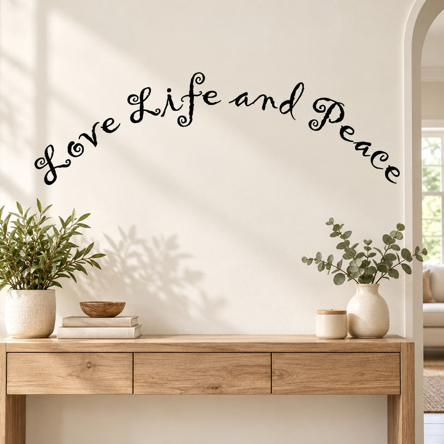 Life and peace wall decal with flowing black cursive lettering
