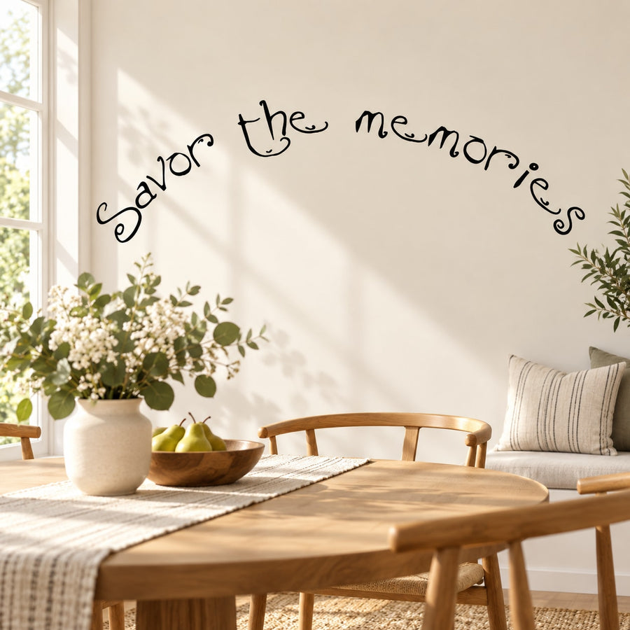 Wall decal reading Savor the memories in black cursive lettering