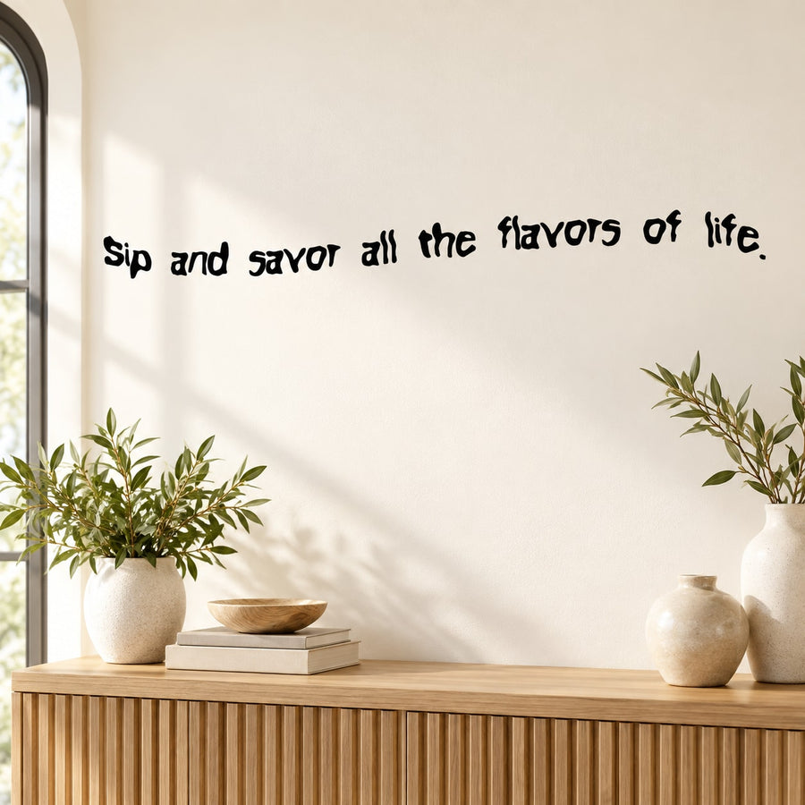 Wall decal with "Sip and savor all the flavors of life" script and leaf sprigs