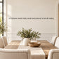 Wall decal: “Sit down and feed, and welcome to our table” with leafy sprigs