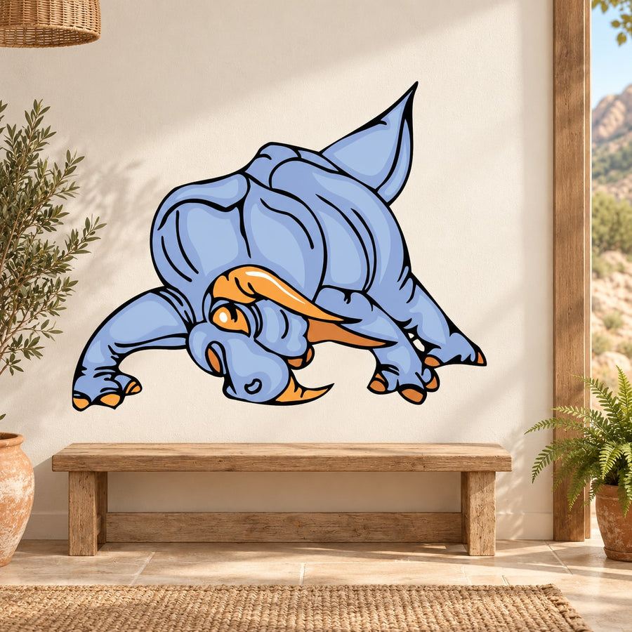 Cartoon triceratops sticker in light blue with orange horn details and bold outline