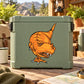 Orange cartoon T-Rex head sticker on light green rectangular backing
