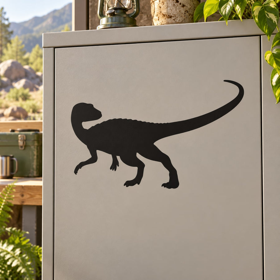 Curious Iguanadon decal with black dinosaur silhouette on white background
