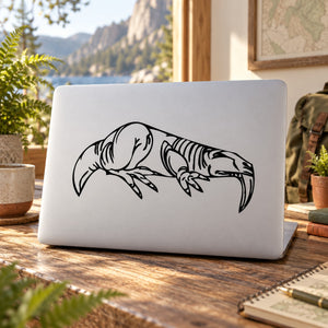 Sabertoothed dinosaur decal with black line-art illustration on white surface