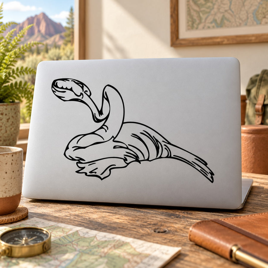 Slithering dinosaur decal with black line art on a white surface