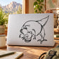 Cartoon T-rex dinosaur decal sticker in black line art on white laptop lid