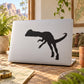 Black Dilophosaurus dinosaur decal silhouette on white laptop lid