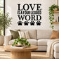 Love is a four legged word wall decal with paw prints lettering