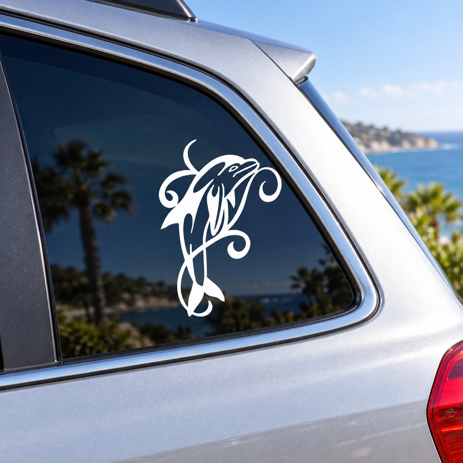 White dolphin wrap decal on car window