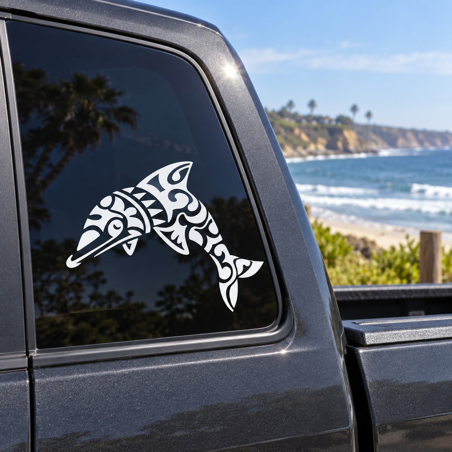Black and white tribal dolphin decal on car side window